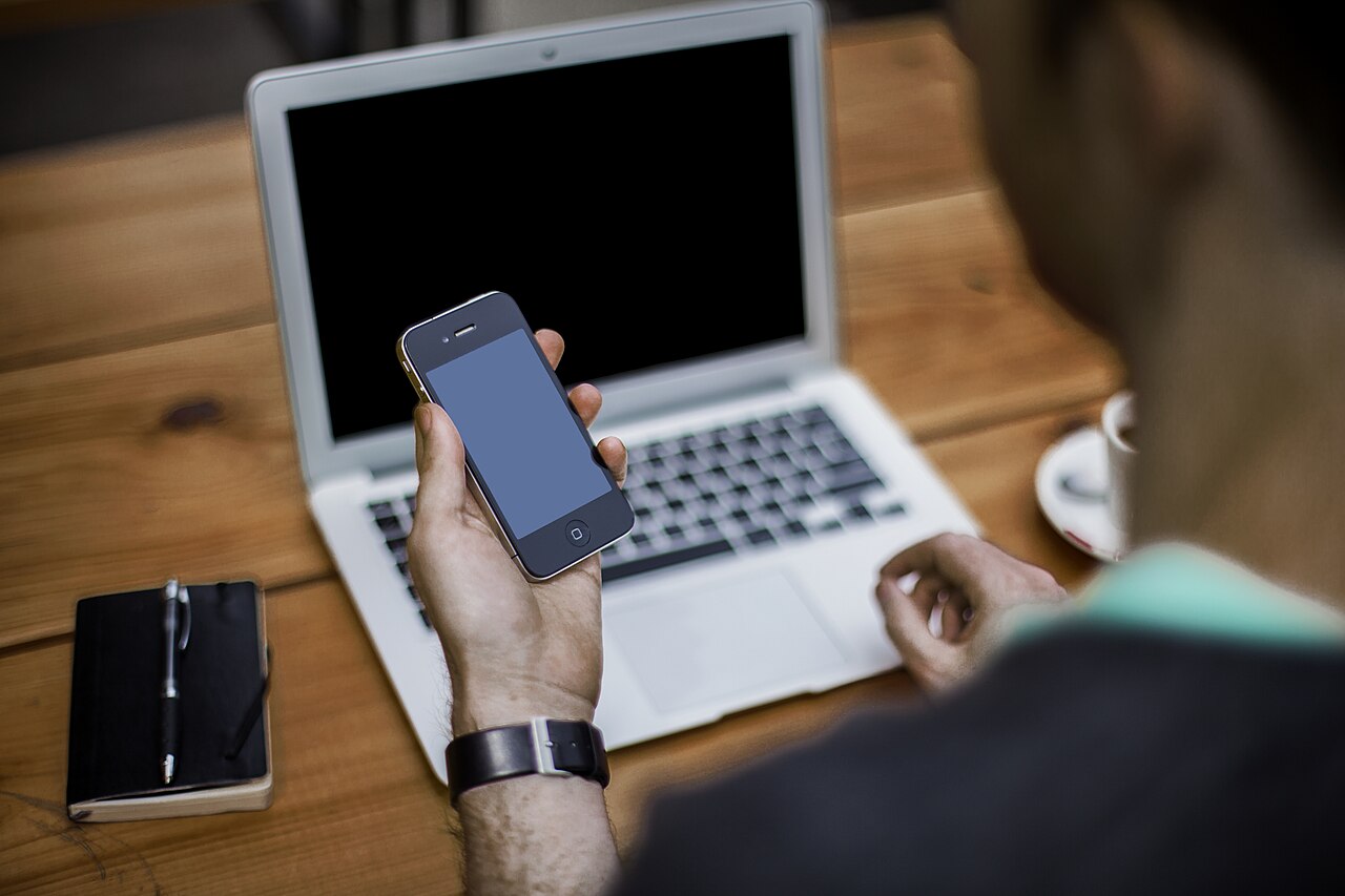 Using a phone and laptop